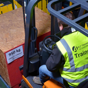 Counterbalance Forklift Truck Training course - A reach forklift in action